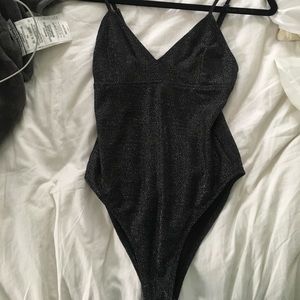 Shimmery metallic body suit